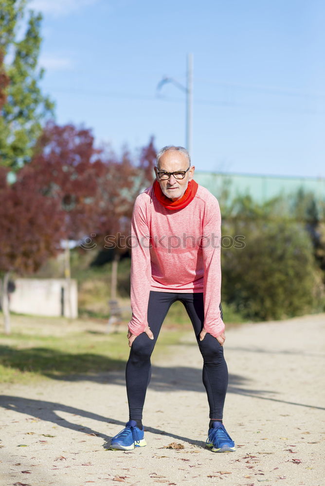 Similar – A beautiful young blonde woman stretching in a park