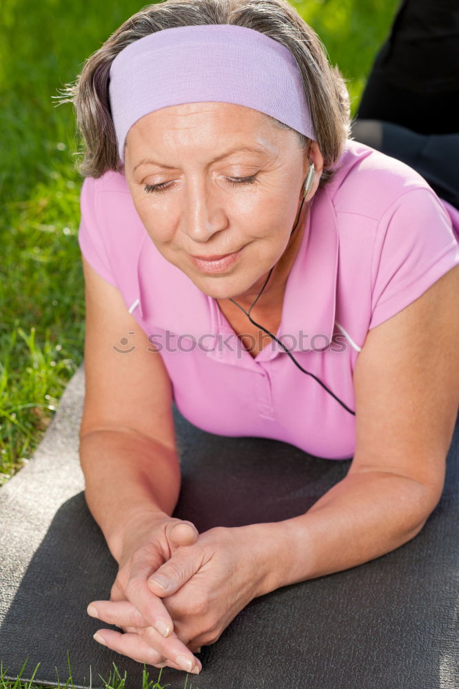 Similar – Image, Stock Photo blonde woman sitting in the grass and stretching in a park