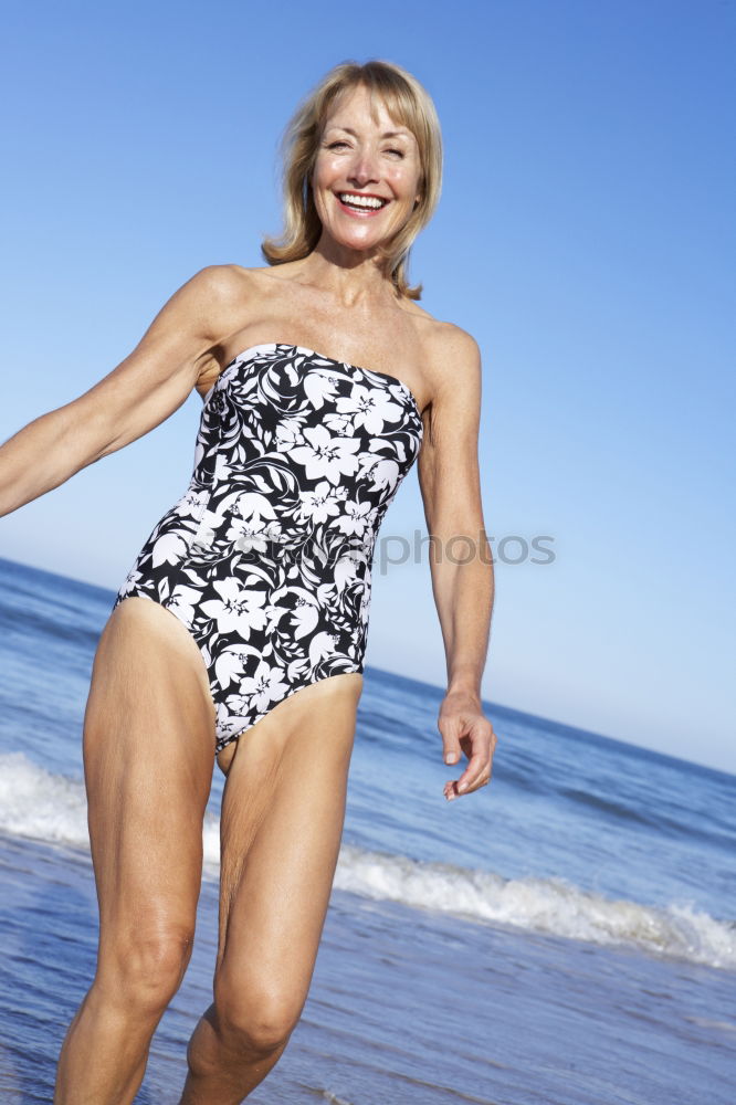 Similar – Senior old woman grey hair sitting by the swimming pool