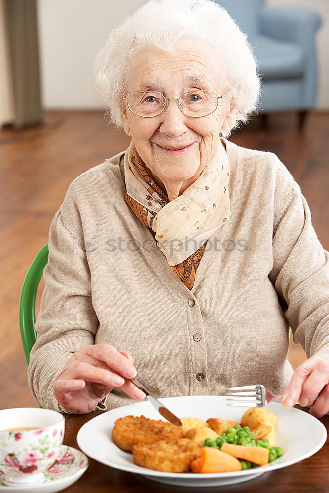 Similar – contented senior has eaten up