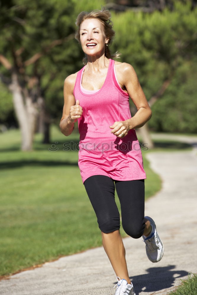 Similar – Image, Stock Photo Athletic woman out jogging in a forest