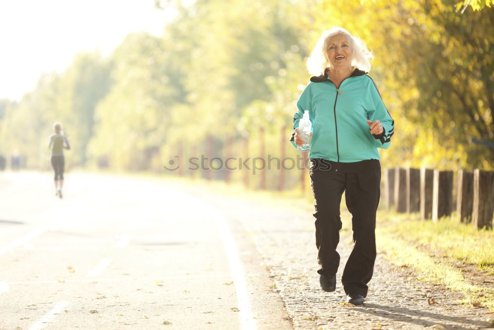 Similar – Image, Stock Photo Pretty fit young woman jogging in woodland