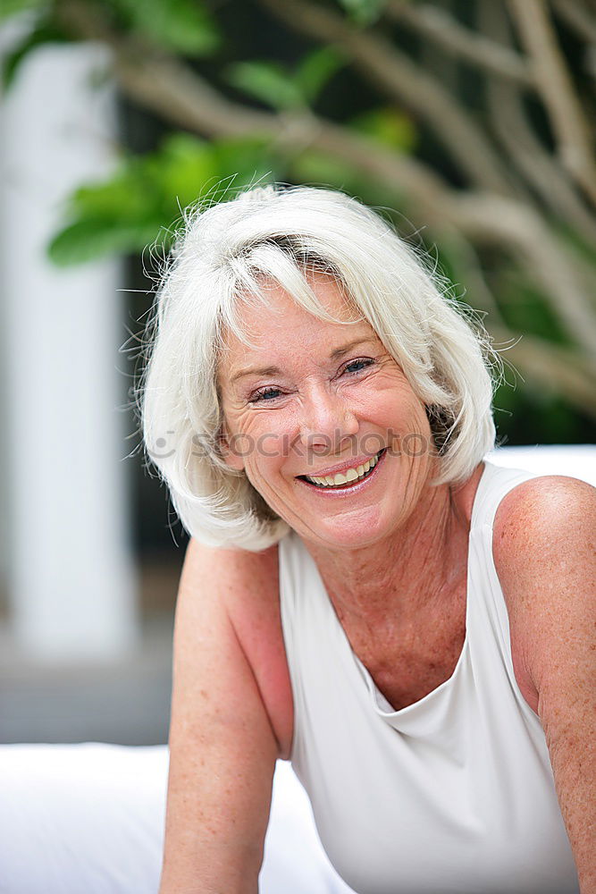 Similar – Image, Stock Photo Happy elderly woman on the mobile phone