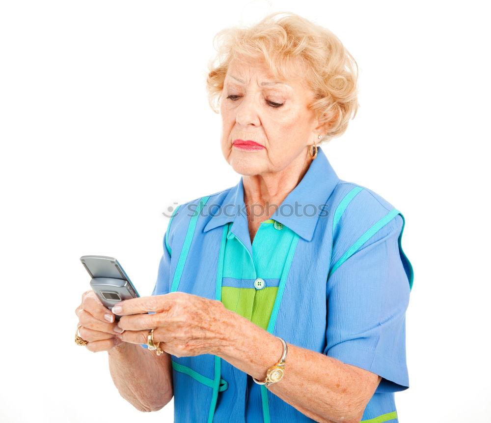 Similar – senior woman using smartphone