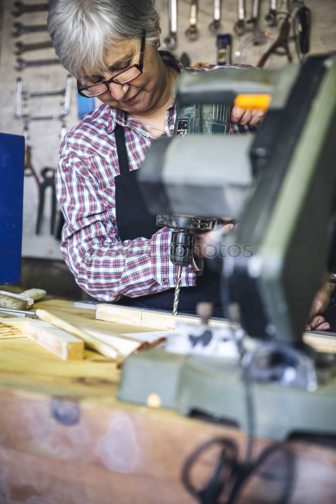 Similar – Image, Stock Photo Mechanic cleaning a motorcycle