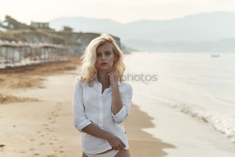 Similar – Image, Stock Photo Young caucasian women walking on the beach