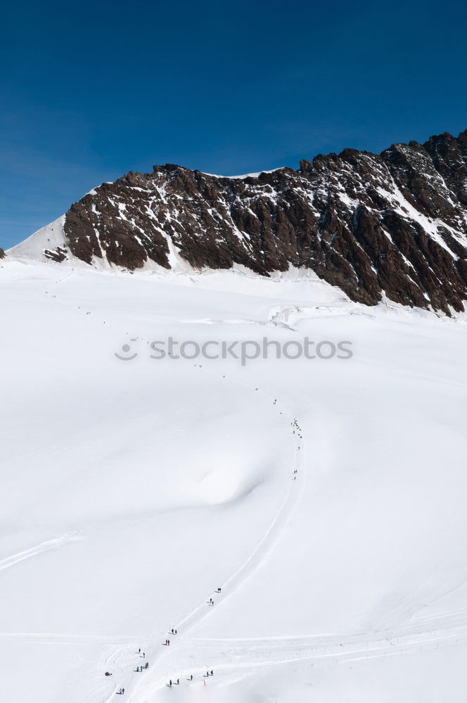 Similar – Image, Stock Photo Ski tips on a glacier in background the Matterhorn