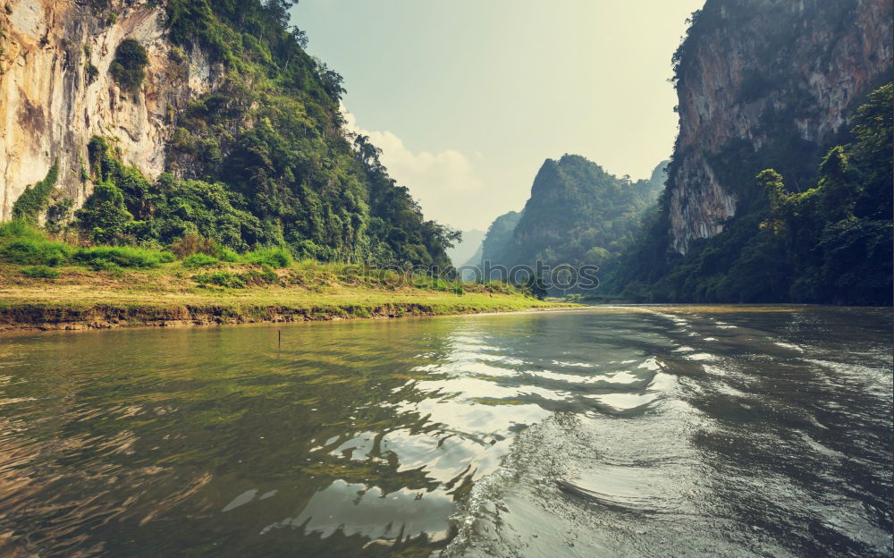 Similar – Landscape Vietnam. River view in the dim light of dusk at Ninhbi