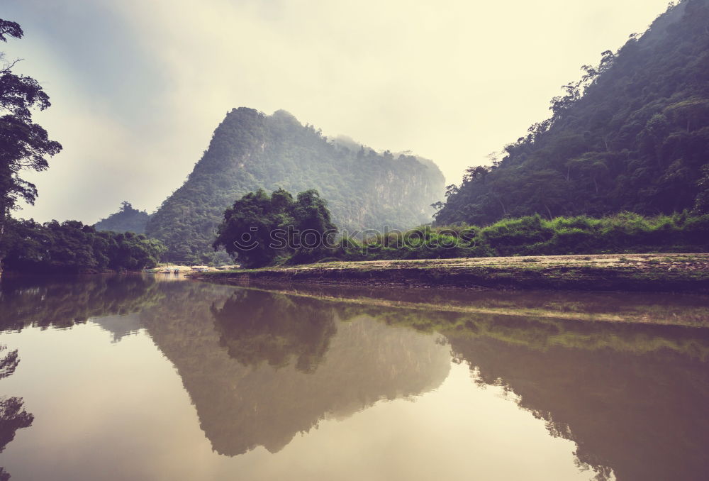 Similar – Image, Stock Photo Landscape Vietnam. River view in the dim light of dusk at Ninhbinh, Tam Coc, Vietnam