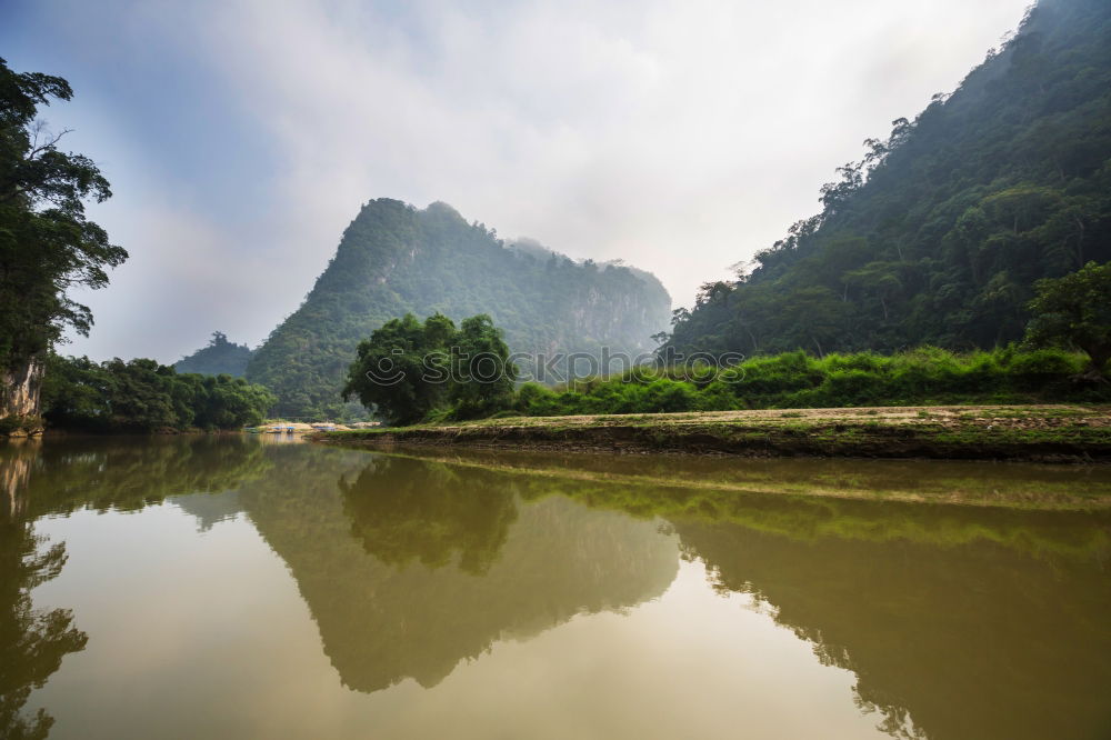 Similar – Image, Stock Photo Landscape Vietnam. River view in the dim light of dusk at Ninhbinh, Tam Coc, Vietnam