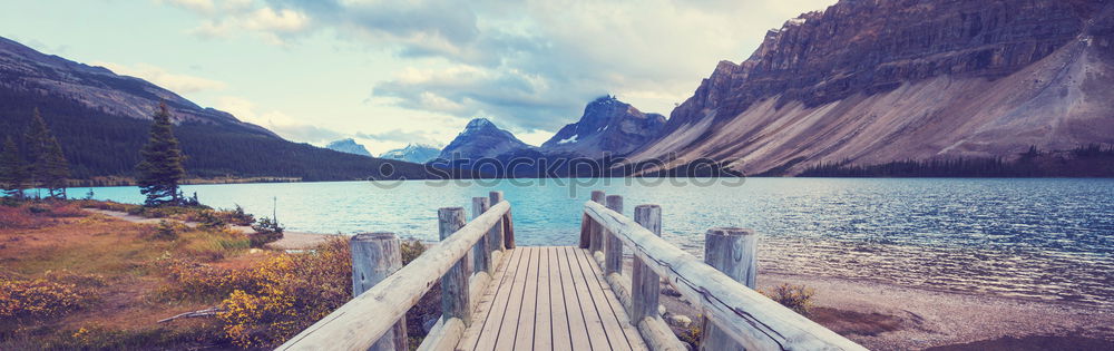 Similar – Image, Stock Photo Wooden footbridge at Silsersee with mountains in the background