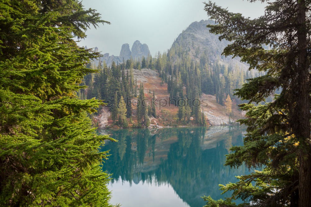 Similar – Image, Stock Photo Braies Lake with clouds in the Dolomites V