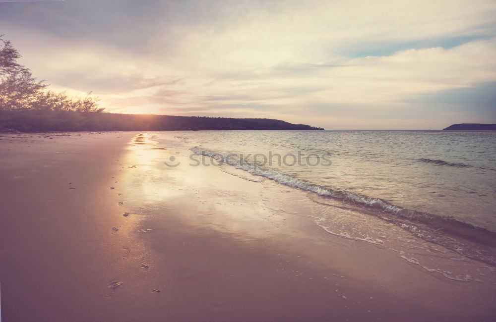 Similar – Deserted beautiful beach with clean beach and water.