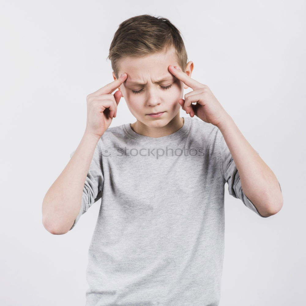 Similar – Image, Stock Photo Portrait of a young sad boy. Concept of lonely.