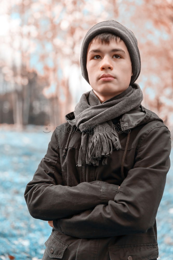 Similar – Serious teenager guy with hood on the head