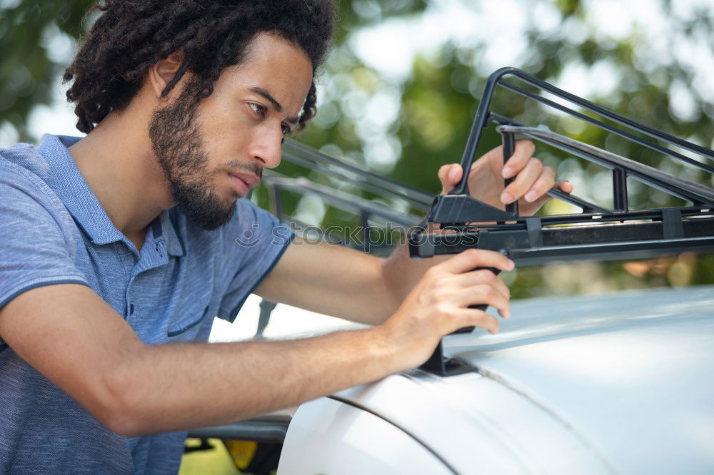 Similar – Image, Stock Photo man looks at the motor broken machine