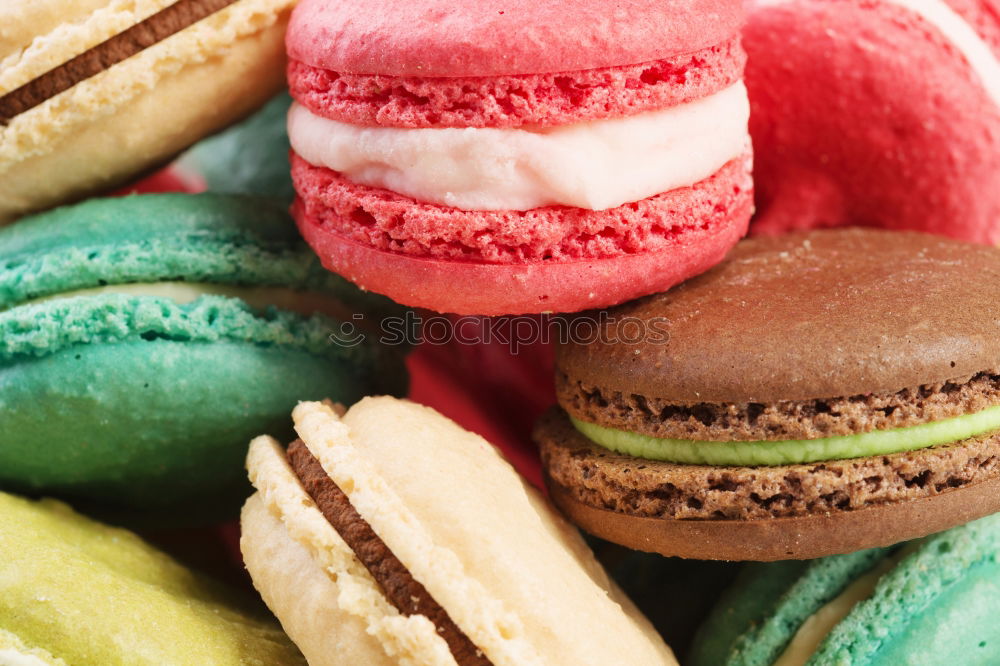 Similar – Image, Stock Photo Three colorful macarons stacked