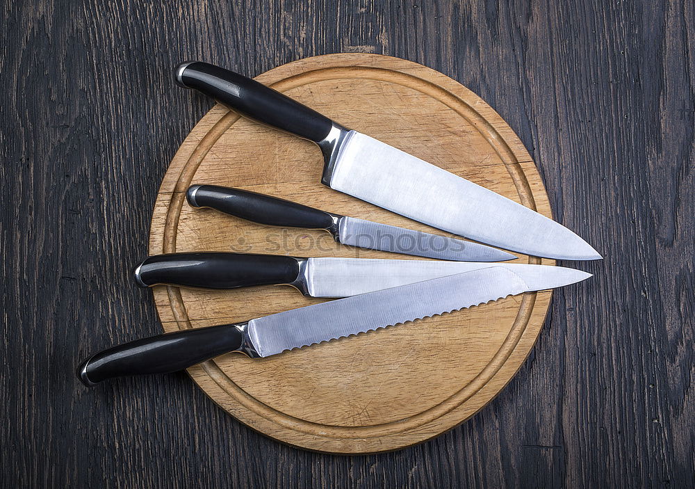 Similar – wooden cutting board and old knife