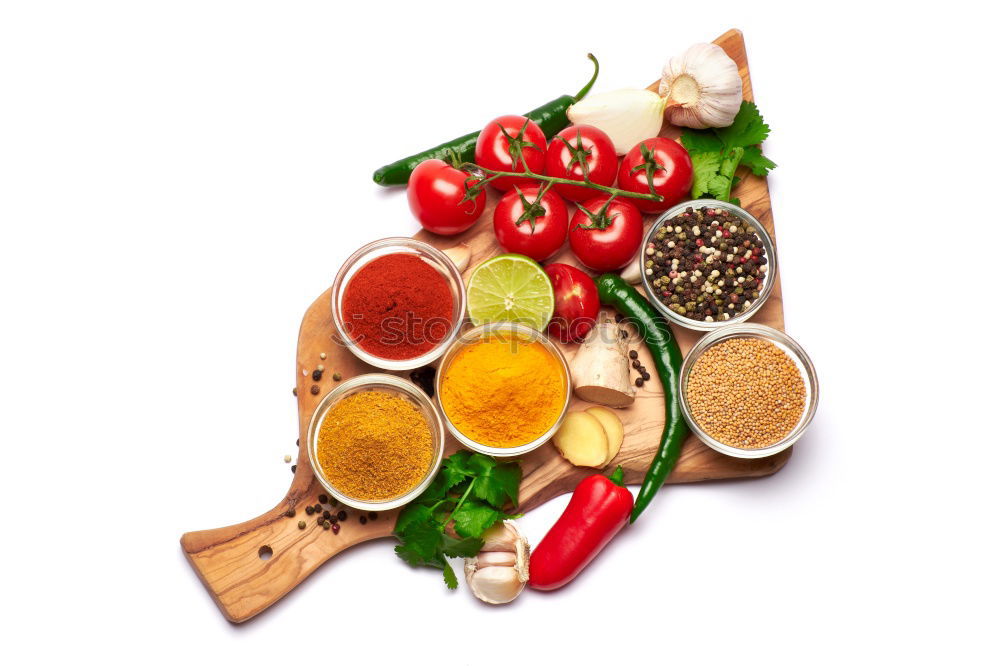 Similar – Image, Stock Photo Colourful chillies and spices on a white wooden table