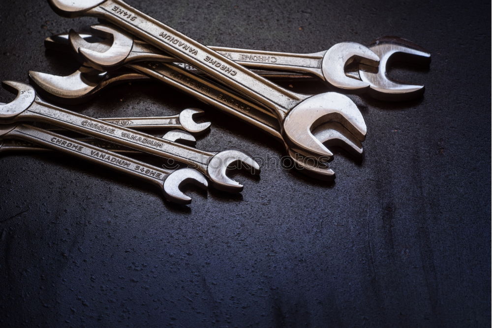 Similar – Image, Stock Photo Who would like? One pair of pliers and three spanners with eyes. Each of the wrenches with the word “I”