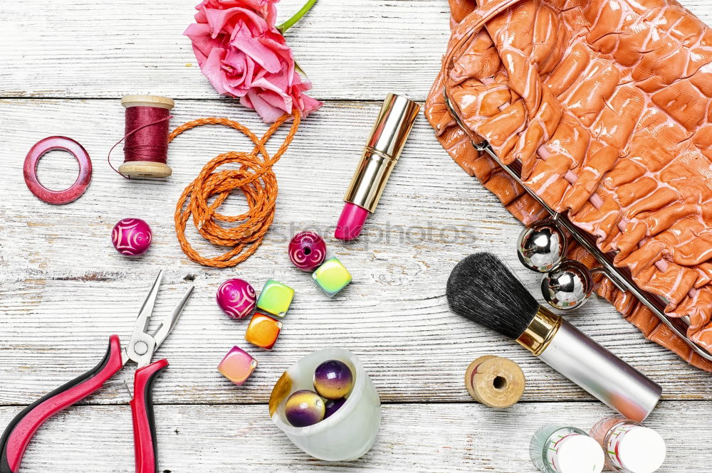 Similar – Image, Stock Photo Red and white things pulled out of red handbag