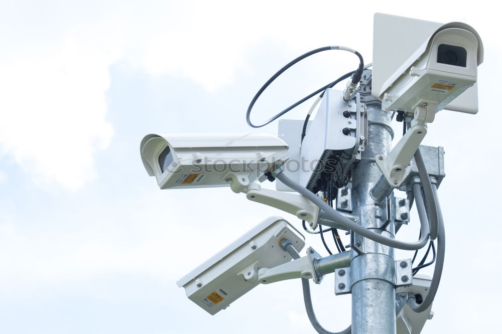 Similar – Industrial Security CCTV Camera installed on metal fence. The camera protects the industrial ground. Blue sky is on the background.