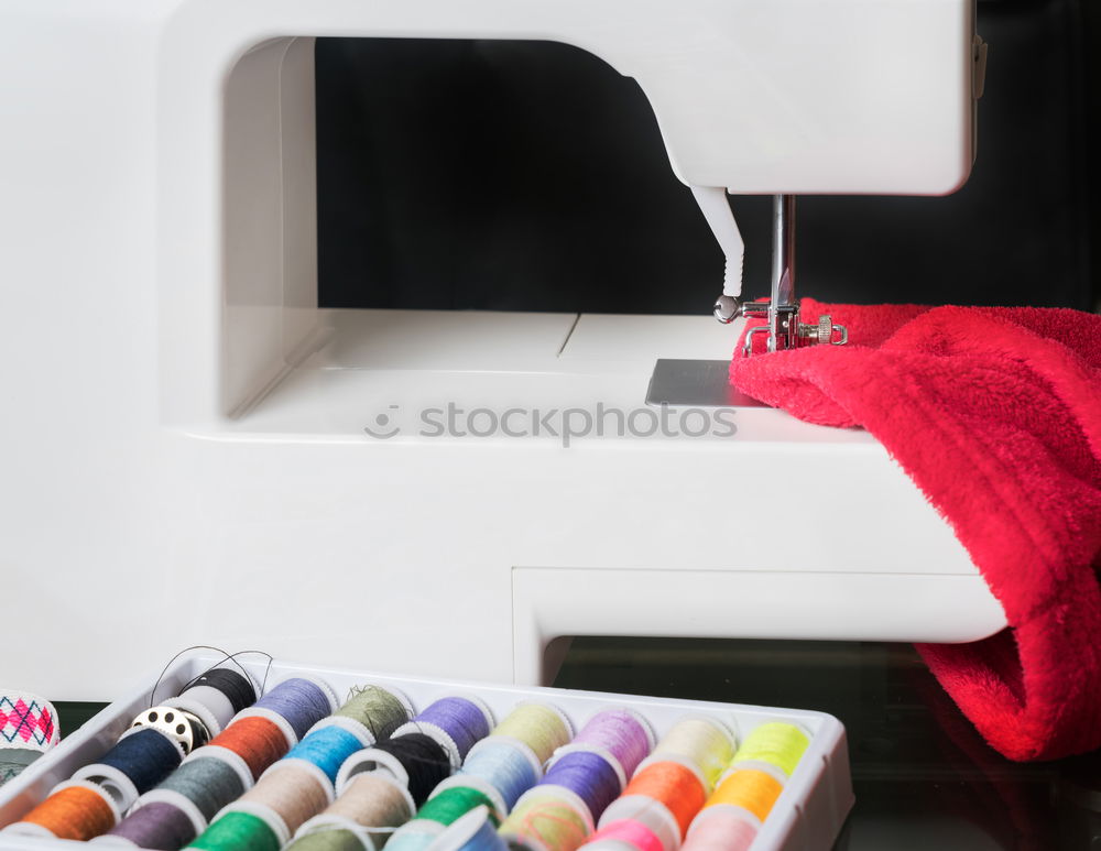 Similar – Image, Stock Photo Woman sewing on a sewing machine