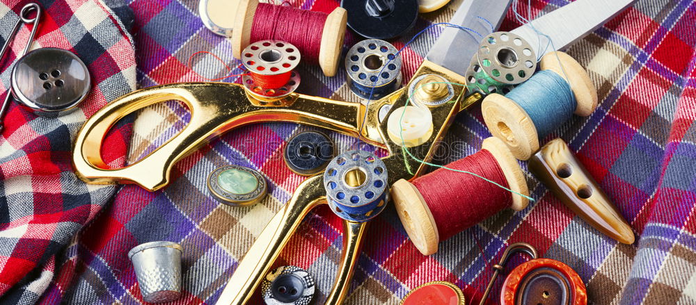 Similar – Image, Stock Photo Sewing buttons and spools of thread