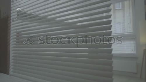 Similar – closed window blinds in the outside view / privacy screen