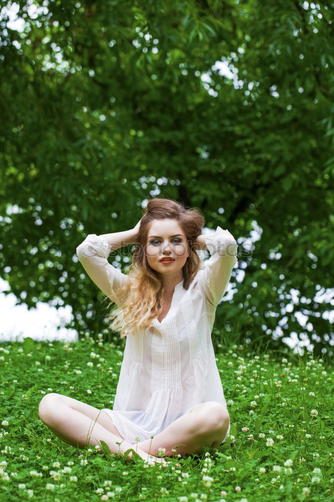 Similar – Summer portrait of long haired teen girl with short jeans shorts and belly top in park