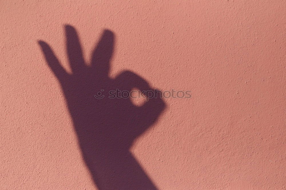 Similar – Heart shadow on the beach