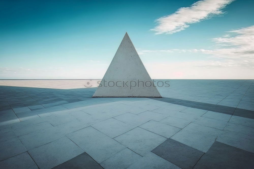 Similar – Low angle view of Little Mermaid statue on large boulder looking away in Denmark under cloudy sky