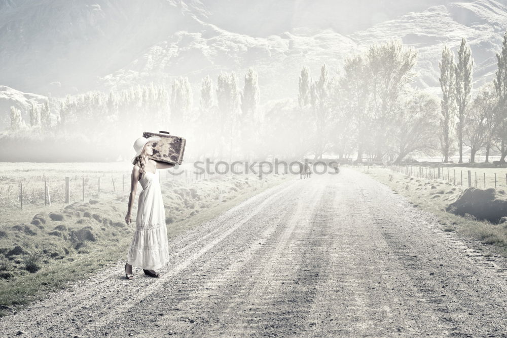 Similar – Mother and her daughter walking outdoors in winter