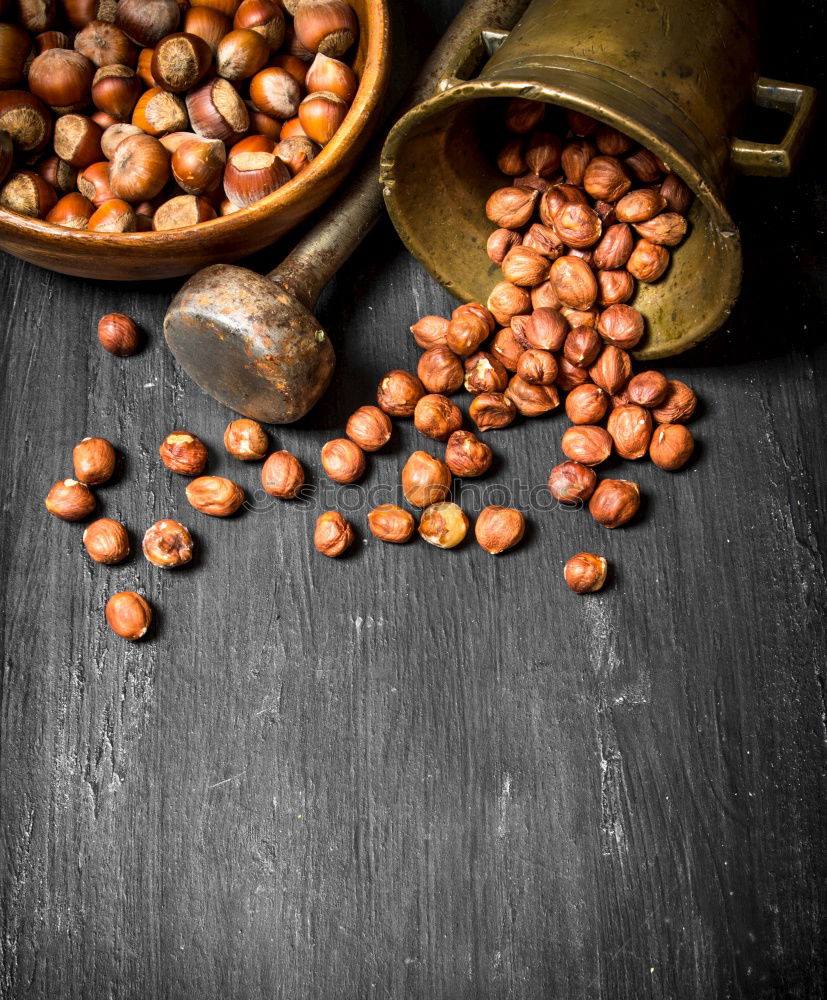 Image, Stock Photo hazelnut nuts in a brown wooden bowl