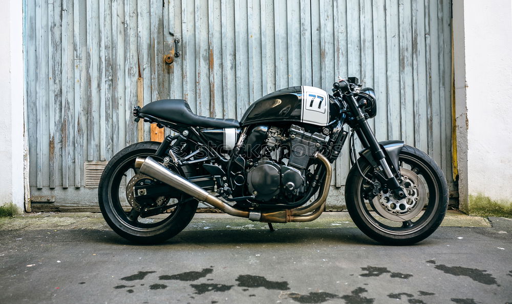 Similar – Image, Stock Photo Biker checking with a motorcycle