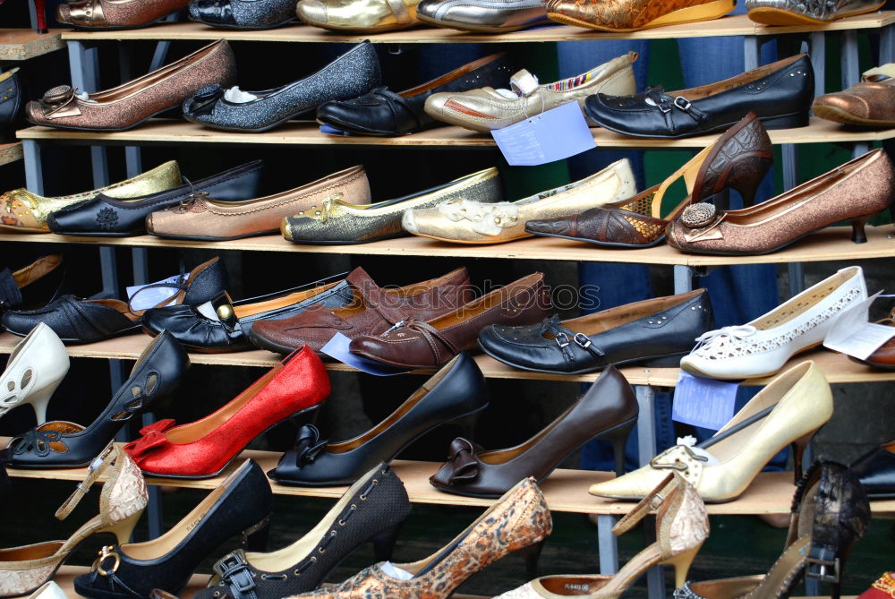 Similar – Image, Stock Photo Shelves with different shoes