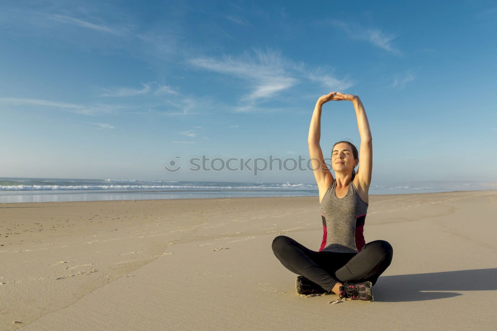 Similar – Caucasian blonde woman practicing yoga in the beach