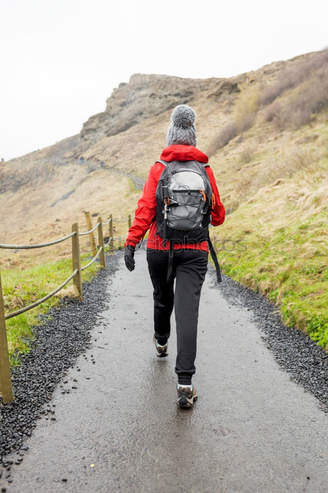 Young Backpacker enjoying of Nature.