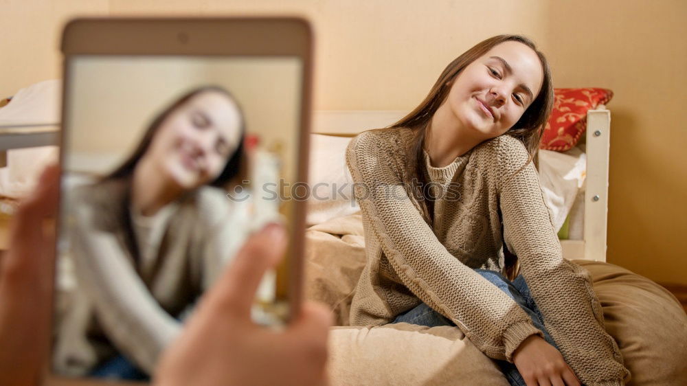 Similar – Image, Stock Photo Teen holds cell phone in front of mouth with picture of his mouth