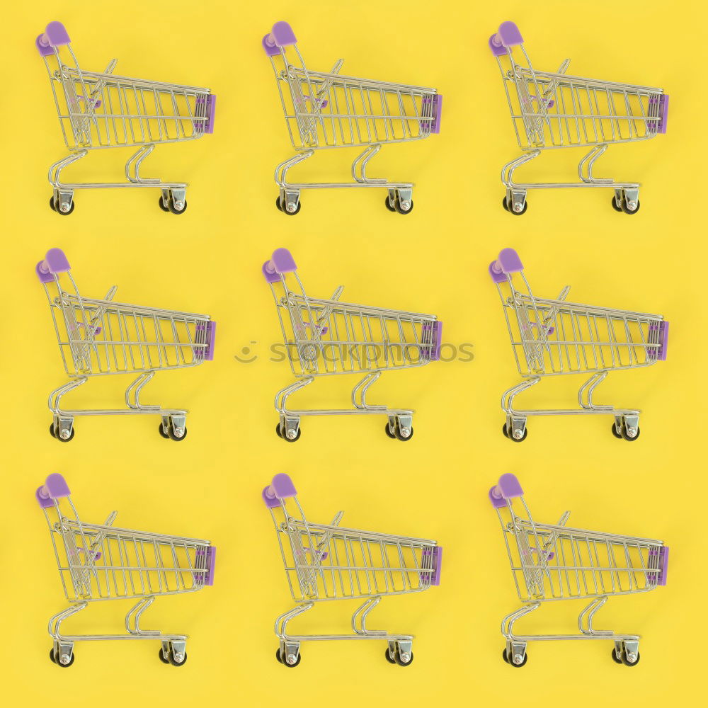 Similar – Image, Stock Photo Close up retail shopping cart over yellow