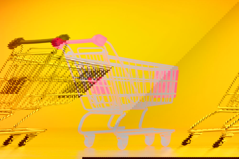 Similar – Image, Stock Photo Close up retail shopping cart over yellow