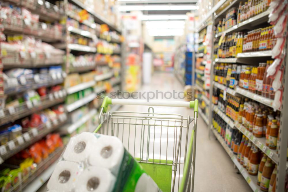 Similar – Image, Stock Photo Empty shopping cart in the supermarket corridor