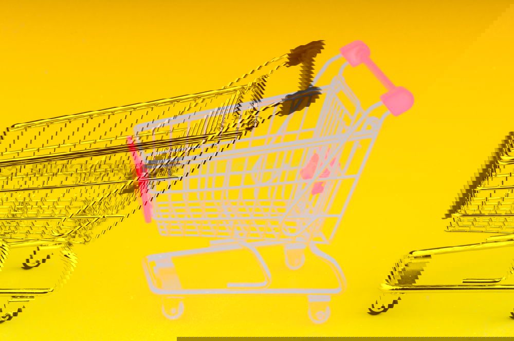 Image, Stock Photo Close up retail shopping cart over yellow