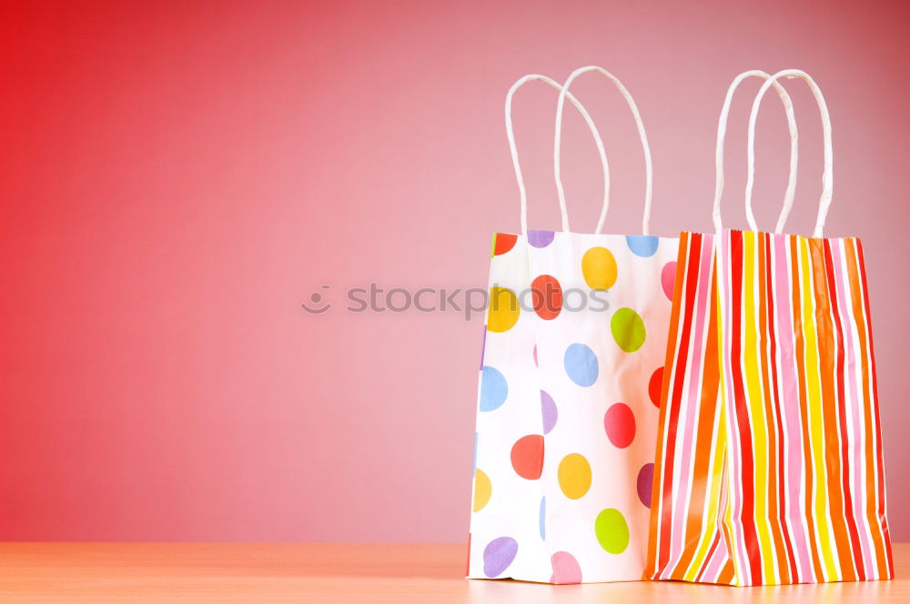 Similar – Paper bag full of black and red gifts