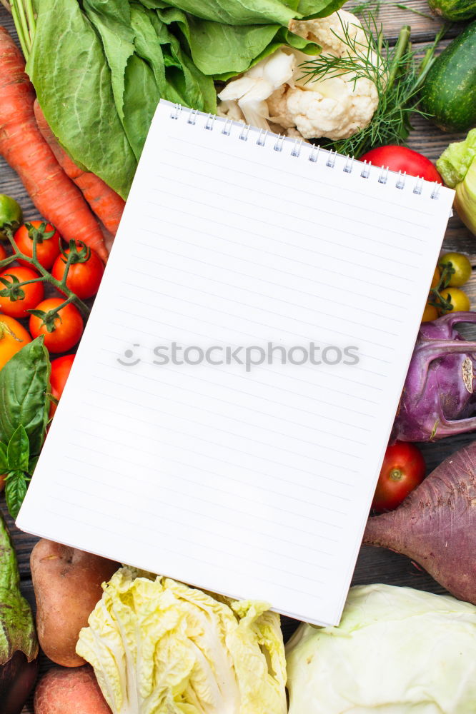 Similar – Fresh vegetables around a white table