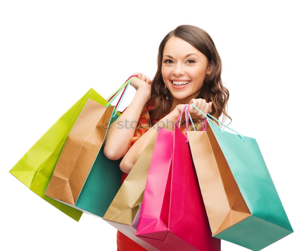 Similar – Shopping bags on womans hand. Woman shopping with colored paper bags.