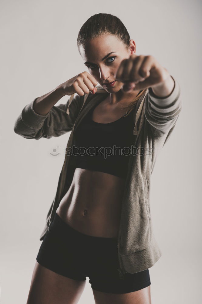 Similar – Image, Stock Photo Sporty woman Posing near Urban Wall Grafitti