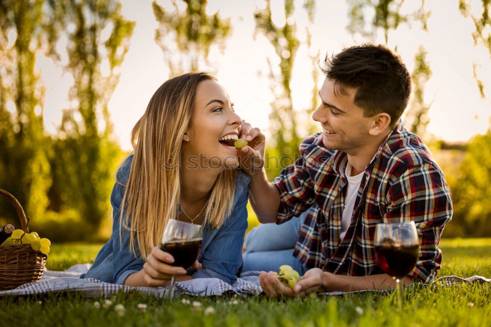 Similar – Couple eating pizza at date night in sunset