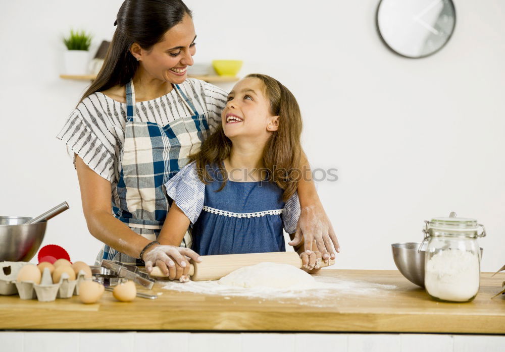 Similar – Image, Stock Photo Little sisters girl preparing baking cookies.