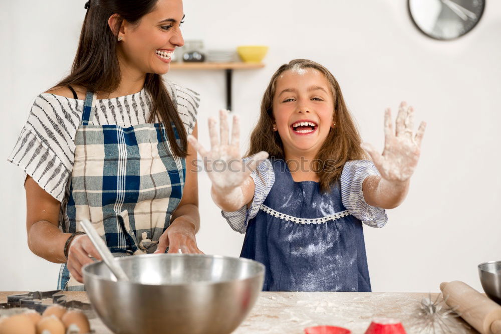 Similar – Image, Stock Photo Little sisters girl preparing baking cookies.